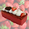 Gâteau fête des mères Maison Gélis à Carbonne avec mousse fruits rouges, biscuit madeleine et macarons vanille.